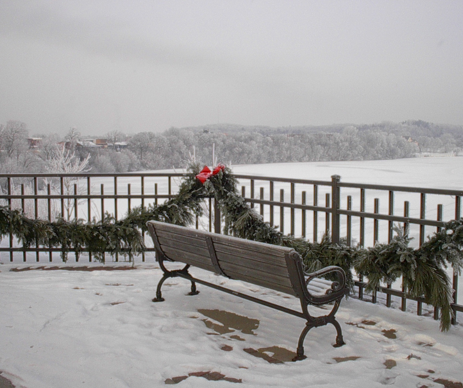 Bench looking over frozen Lake Menomin